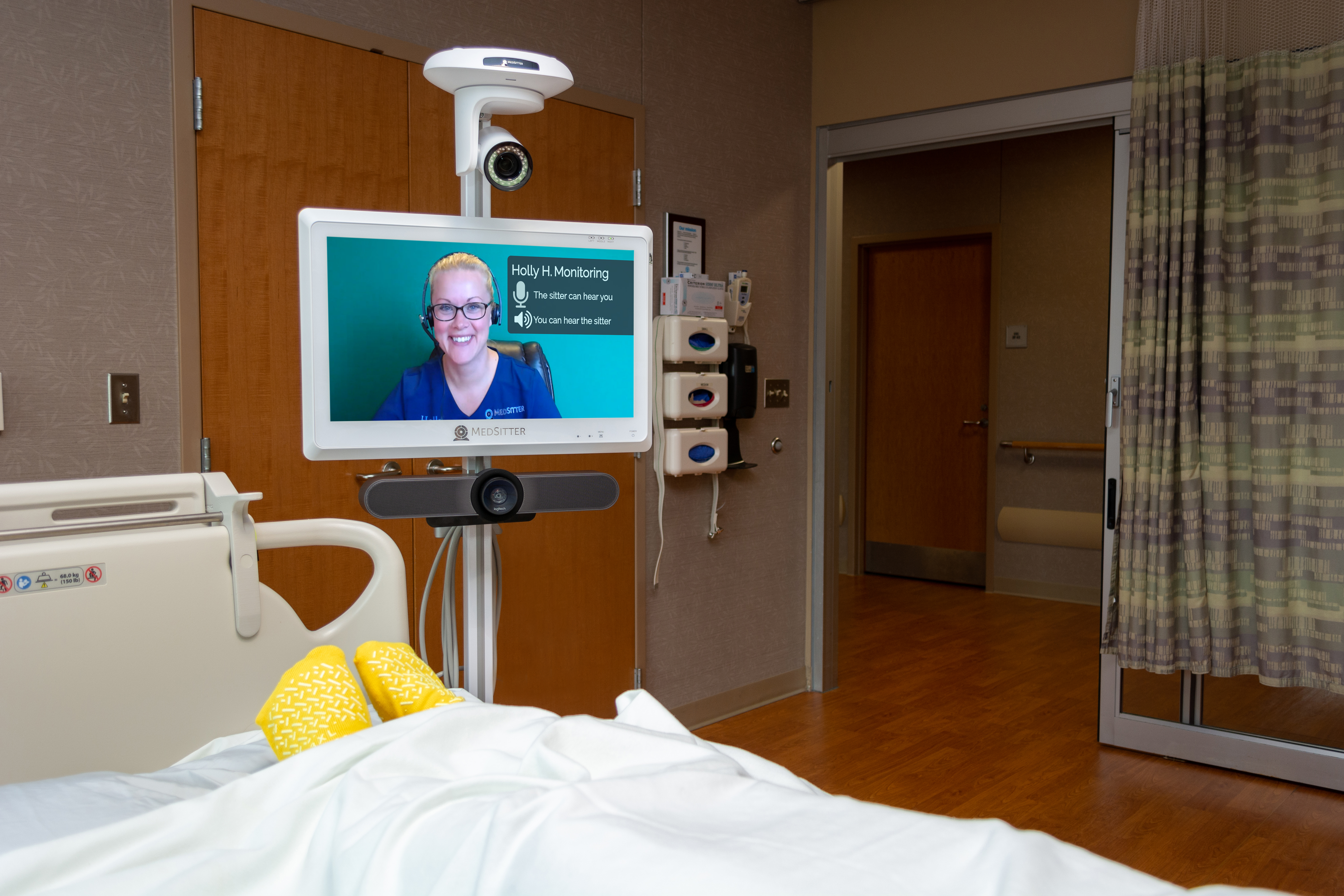 What is a patient sitter?